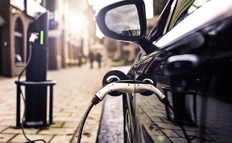 Electric Vehicle in Park Charging station in UK Street