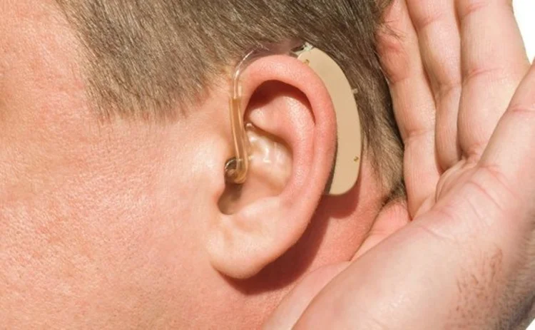 Man with a hearing aid